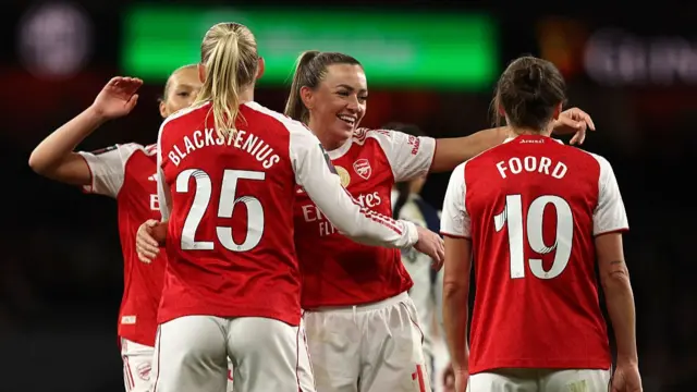 Arsenal players celebrate