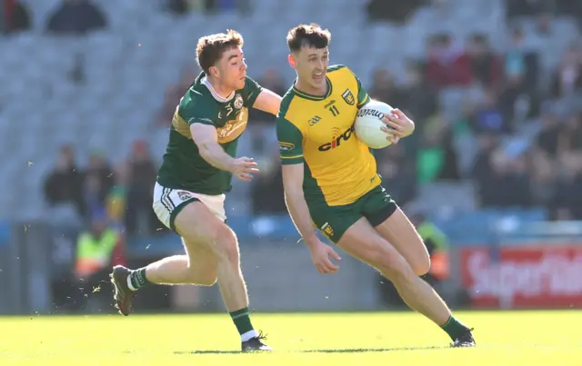 Kerry’s Armin Heinrich and Michael Langan of Donegal