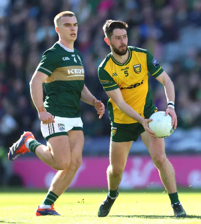 Kerry’s Dylan Casey and Ryan McHugh of Donegal