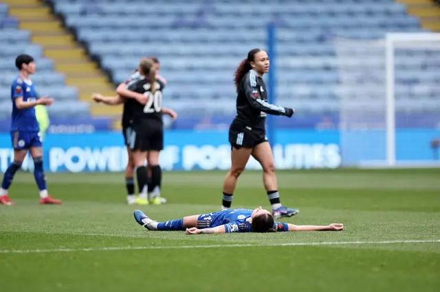 Leicester player lies on the floor defeated