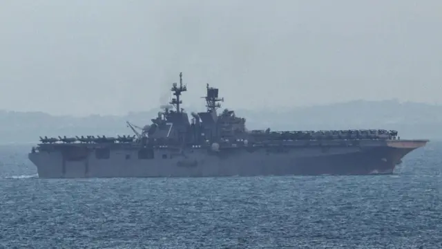 USS Tripoli (LHA-7) amphibious assault ship enters the Singapore Strait
