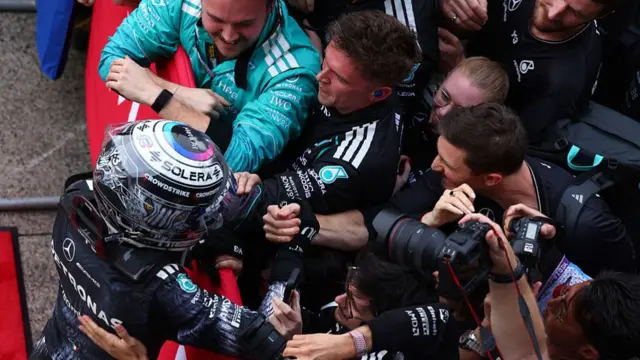 Kimi Antonelli celebrating with his Mercedes team