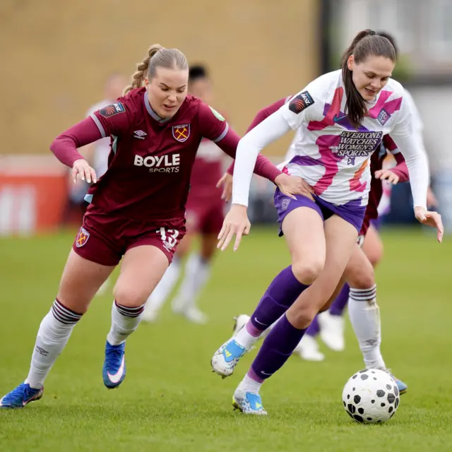 Goodwin dribbles away from her marker