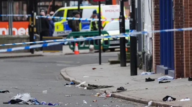 Debris in Friar Gate where pedestrians were hit by car