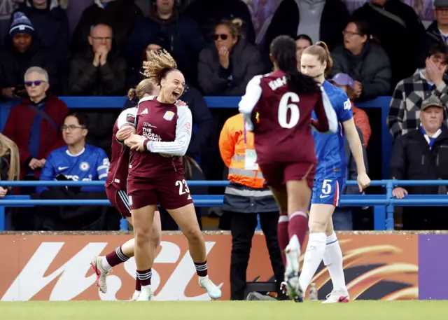 Chasity Grant celebrates scoring the opener v Chelsea