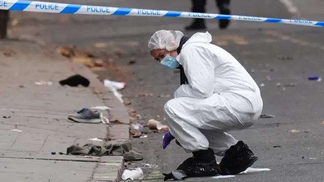 A forensic investigator at the scene in Friar Gate, Derby