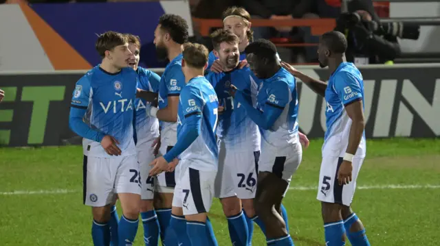 Stockport players celebrating Ollie Norwood's goal against Doncaster