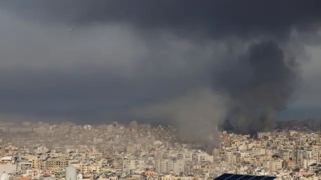 Smoke rises after an Israeli strike on Beirut's southern suburbs