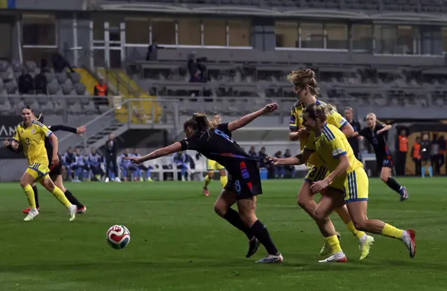 AGeorgia Stanway of England is held by Maryna Shaynyuk of Ukraine during the 2027 FIFA Women's World Cup Qualifier between Ukraine and England at Mardan Sports Complex on March 03, 2026.