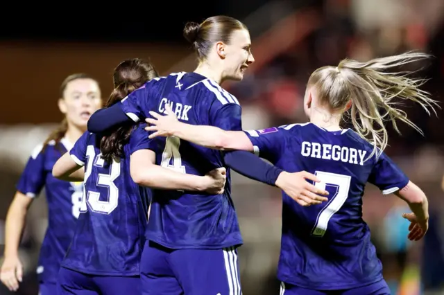 Jenna Clark celebrates with her teammates
