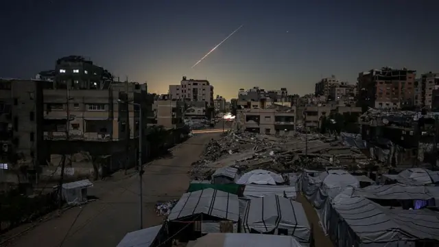 Iranian rockets heading toward Israel are seen crossing the sky over Gaza City on March 3, 2026