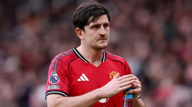 Harry Maguire of Manchester United reacts as he leaves the pitch towards the tunnel after being substituted