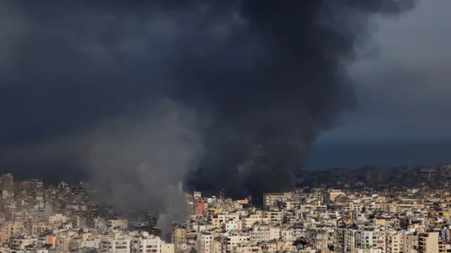 A plume of smoke rises above Beirut