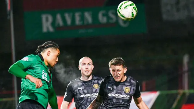 Action from Glentoran v Carrick