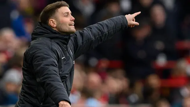 Brighton & Hove Albion manager Fabian Hurzeler shouts instructions to his team from the technical area