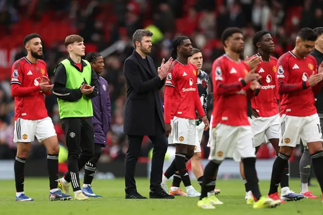 Michael Carrick, Manager of Manchester United, applauds the fans after the team's victory in the Premier League match between Manchester United and Crystal Palace