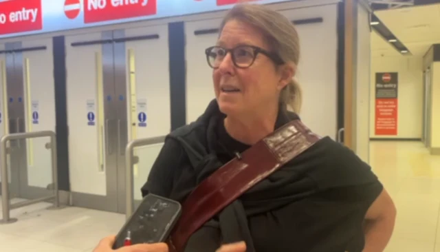 Kylie Bergman speaking at Manchester Arrivals