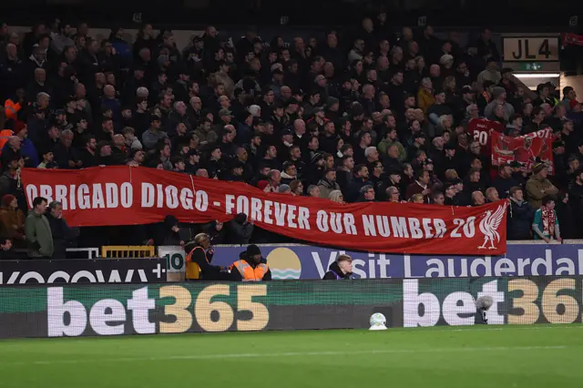 Fans display a banner dedicated to former Wolves and Liverpool player Diogo Jota