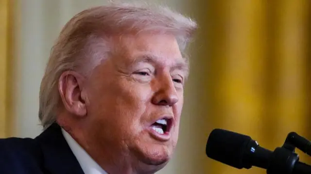 The US president, pictured yesterday