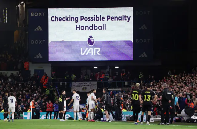 The LED board shows the VAR check for a penalty to Sunderland