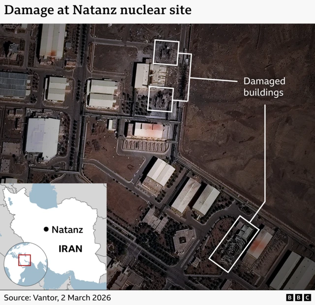A satellite image highlighting three damaged buildings
