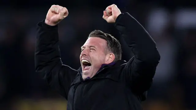 Rob Edwards celebrating