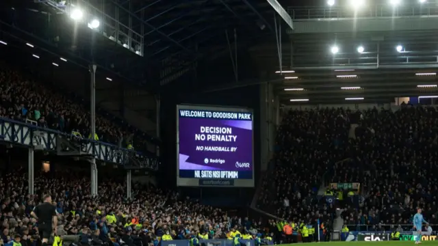 The VAR screen at Goodison Park showing 'Decision no penalty. No handball by Rodrigo'