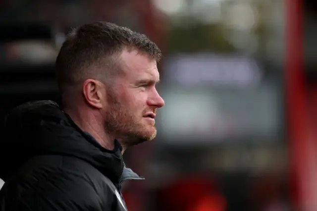 Chris Brunt watches a game