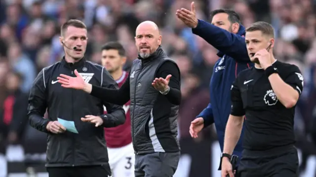 Erik ten Hag reacts with officials on sideline against West Ham