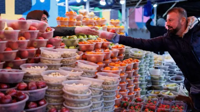 A market in Dalston, east London, pictured last week. The National Farmers' Union has also warned that fuel and fertiliser spikes will mean an increase in food prices