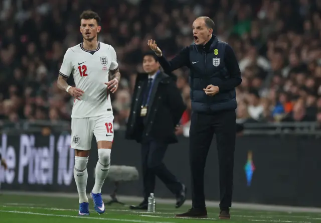 England manager Thomas Tuchel reacts as Ben White looks on