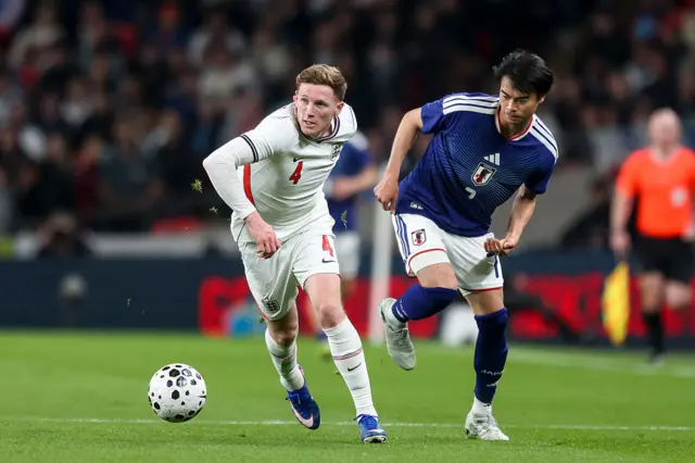 Elliot Anderson of England holds off Kaoru Mitoma of Japan during the international friendly match between England and Japan at Wembley Stadium on March 31, 2026 in London, England.
