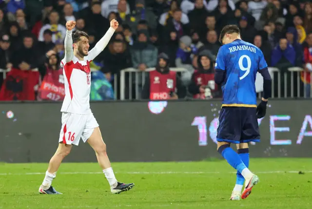 Ismail Yueksek celebrates