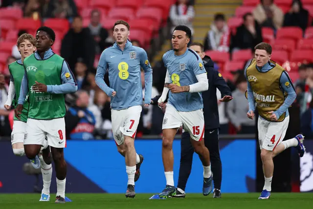 Cole Palmer and Morgan Rogers of England warm up prior to the international friendly match between England and Japan at Wembley Stadium on March 31, 2026 in London, England.
