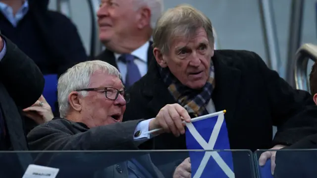 Sir Alex Ferguson chats to Kenny Dalglish