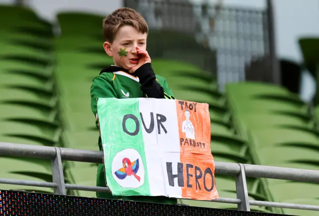 Fan with Troy Parrott banner