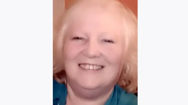 Family photograph of Esther Martin smiling