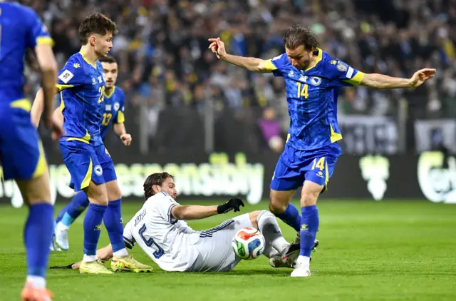 Ivan Sunjic of Bosnia and Herzegovina in action against Manuel Locatelli
