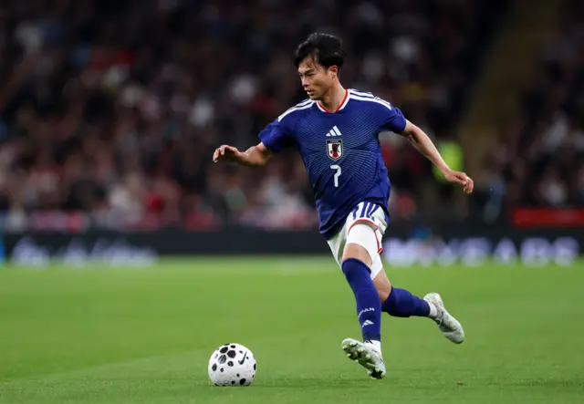 Japan's Kaoru Mitoma in action during the international friendly match between England and Japan at Wembley Stadium in London, Great Britain, 31 March 2026.