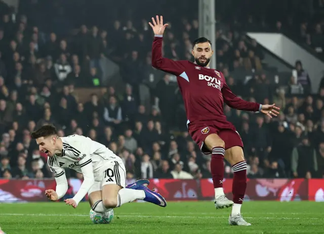 West Ham United's Valentin Castellanos fouls Fulham's Tom Cairney as a penalty is awarded