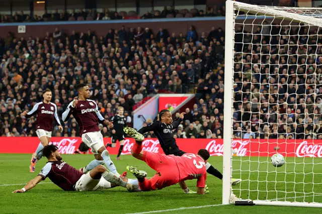 Chelsea's Brazilian striker #20 Joao Pedro scores the team's first goal