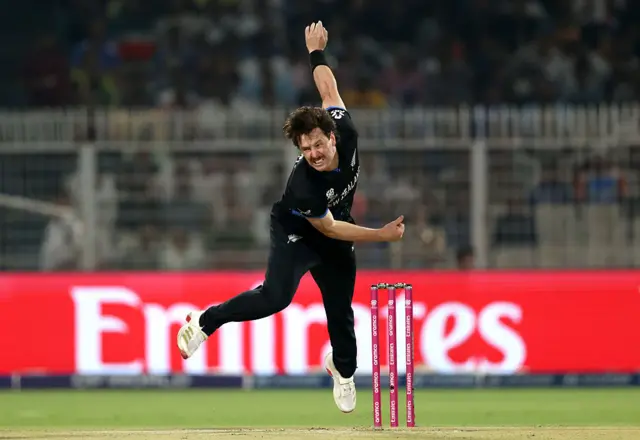 Matt Henry of New Zealand bowls