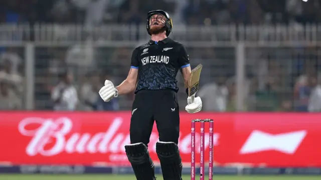 Finn Allen of New Zealand celebrates reaching his century to win the ICC Men's T20 World Cup India & Sri Lanka 2026 Semi-Final match between South Africa and New Zealand at Eden Gardens