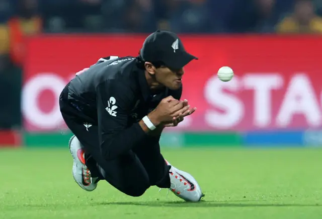 New Zealand's Rachin Ravindra in action as he attempts a catch