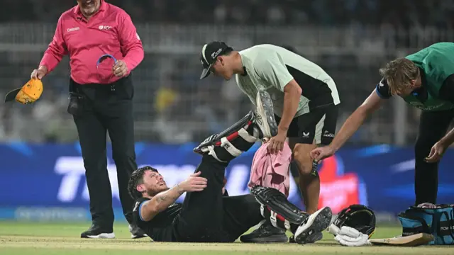 New Zealand's Finn Allen receives medical treatment