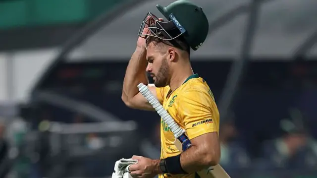 Aiden Markram of South Africa walks off the pitch after losing his wicket