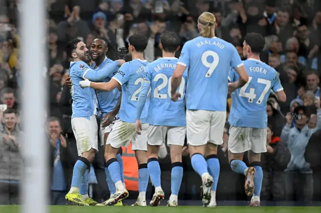Antoine Semenyo of Manchester City celebrates scoring his team's first goal