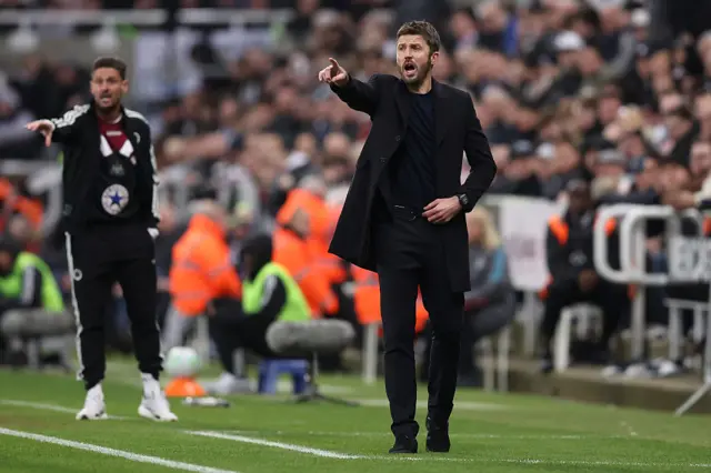 Michael Carrick, Manager of Manchester United, gestures