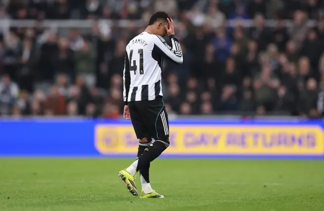 Jacob Ramsey of Newcastle United looks dejected as he walks off the pitch