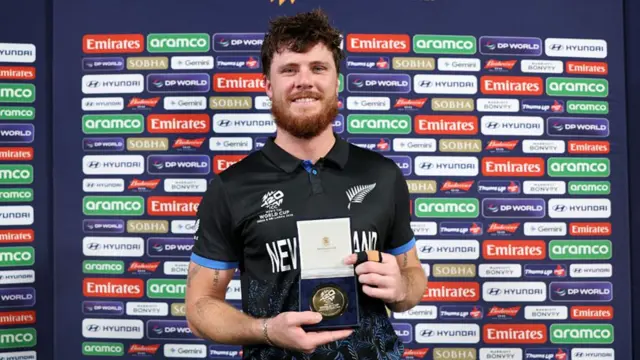 Finn Allen of New Zealand poses for a photo with the Player Of The Match award after the team's victory